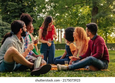 A Group Of Diverse Young People Are In The Community Park Reunited After Long Covid19 Lockdowns