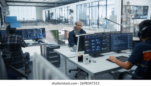 Group of Diverse Young Programmers Working Behind Desks, Using Computers to Write Software Code, Creating Complex Algorithms, Visualizing Big Digital Data Sets for AI Computing Project - Powered by Shutterstock - Get 15% off with code: PIKWIZARD15