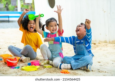 Group of Diversity children kid playing sand with toy together at playground in the park on summer vacation. Little child boy and girl friends enjoy and fun outdoor activity playing together at school - Powered by Shutterstock