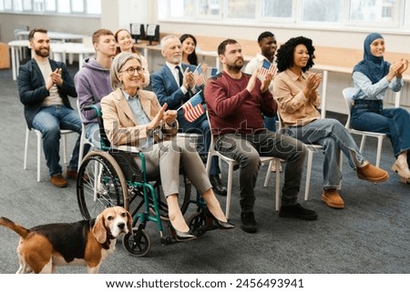 Group of diversity, multinational US citizens at campaign meeting with candidate, listening, sitting at press conference. Concept of presidential election, campaign, 2024