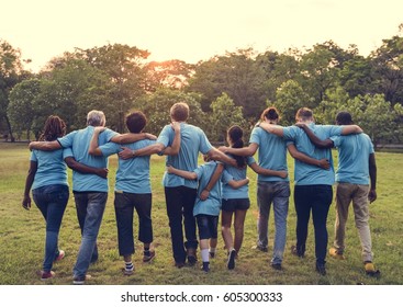 Group of diversity people volunteer arm around - Shutterstock ID 605300333