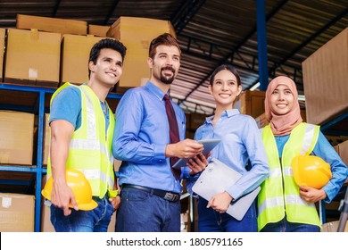 Group of Diversity warehouse worker standing and Proud of the team for vision and target of manager in local warehouse, muslim, indian, white caucasian and asian people in export industry concept