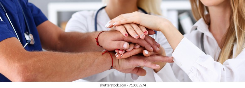 Group Of Doctor Crossed Arms In Pile For Win Closeup. High Five, Cooperation Initiative Achievement, Heap, Stack, People Cure Strategy, Colleague Competition, Heal Alliance, Hospital Visit Concept