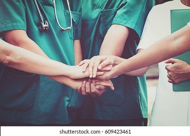 Group of Doctors and nurses coordinate hands. Concept Teamwork in hospital for success work and trust in team - Shutterstock ID 609423461