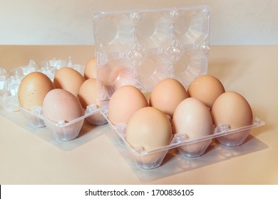 Group of eggs in a plastic box. Fresh stored food