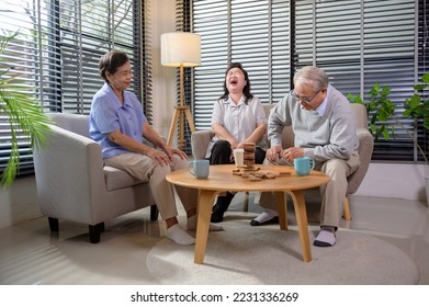 Group of elderly people enjoy talking , relaxing with game at  senior healthcare center. - Shutterstock ID 2231336269