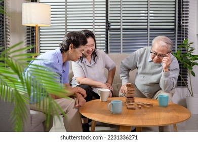 Group of elderly people enjoy talking , relaxing with game at  senior healthcare center. - Shutterstock ID 2231336271