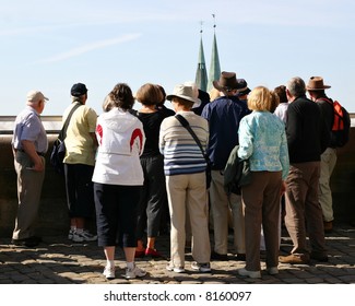 Group Of Elderly Tourists On A Sightseeing Tour In Germany