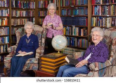 A Group Of Elderly Women In An Assisted Living's Residence Library