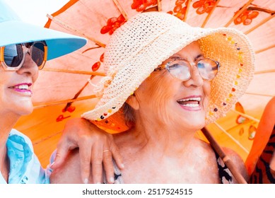 A group of elderly women with a youthful spirit and playful attitude enjoy their summer vacation outdoors, celebrating friendship and retirement with joy and laughter. The image captures their vibrant - Powered by Shutterstock