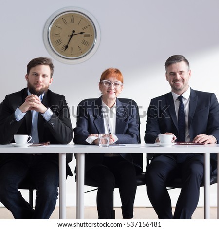 Group of elegant businessman having a meeting about jobinterview