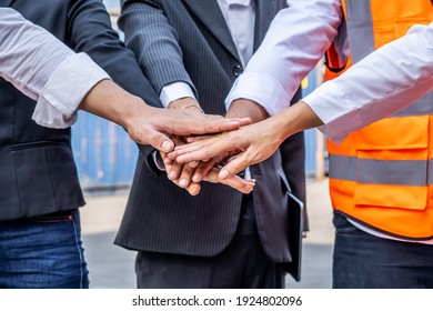 Group Of Employees And Management Team Wearing Logistic Uniforms For Exporting Products Abroad, Stand To Put Your Hands Up And Raise Your Hands Together For A Harmonious Work Experience