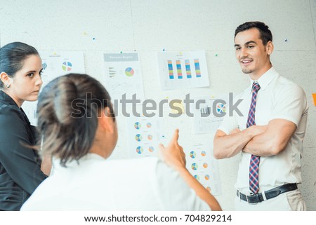 Group of employees talking and having fun in the business meeting, Elegant business partners man and woman listening to colleague at meeting