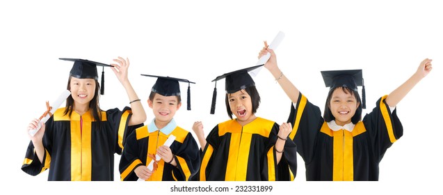 Group Of Excited School Kids In Graduation Gown