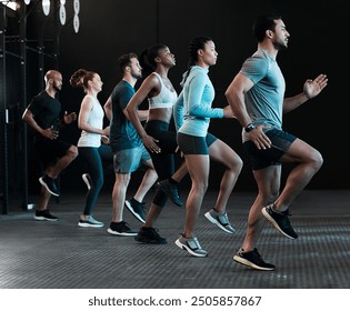 Group, exercise and cardio training or fitness, workout and gym class, club or team running for challenge. People, personal trainer or friends exercising for weight loss, endurance and health - Powered by Shutterstock