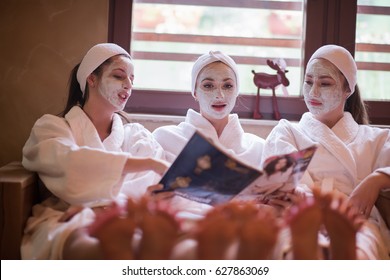 Group Of Famale Friends In Spa Have Fun, Celebrate Bachelorette Party With Face Mask