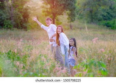 group of family holding hand together walks to the successfully light of destination  - Shutterstock ID 1505708225