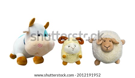 group of farm animals doll  against white background , livestock concept,
