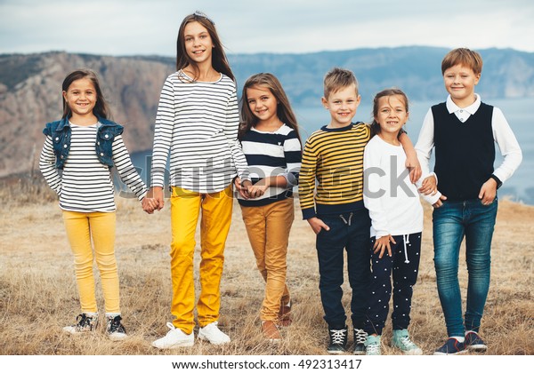 Group Fashion Children Wearing Same Style Stock Photo (Edit Now) 492313417