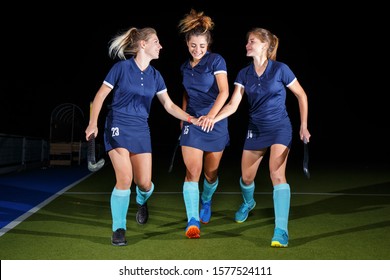 Group Of Female Field Hockey Players Celebrate The Victory