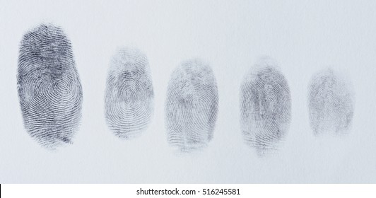 Group Of Finger Prints On White Paper Texture