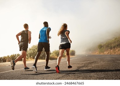 Group, fitness and sport with running in outdoor by training, exercise and practice for marathon competition of cardio health. People, athlete and workout as runner together for performance goal - Powered by Shutterstock