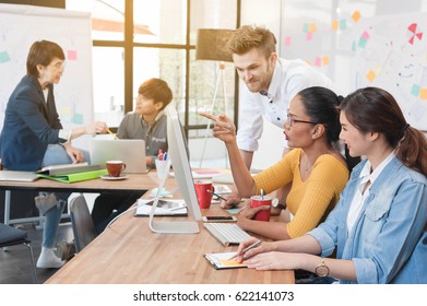 group of five multi generation of creative work place, modern style of work, entrepreneur group brainstorming multi generation of creative work place, modern style of work