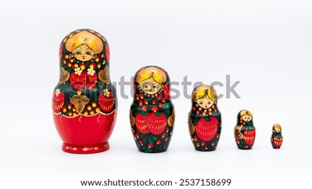 Group of five Russian Matryoshka dolls, isolated on white