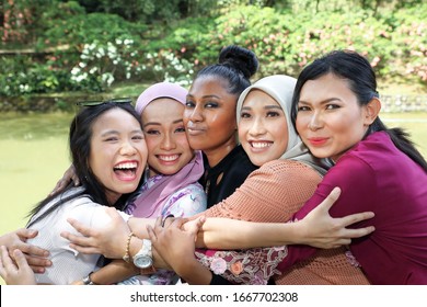 Group Of Five Woman Friends Malay Chinese Indian Asian Outdoor Park Lake Nature Hugging Caring Laughing Happy 