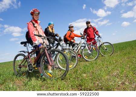 Similar – Image, Stock Photo 4 sporty cyclists on a bridge