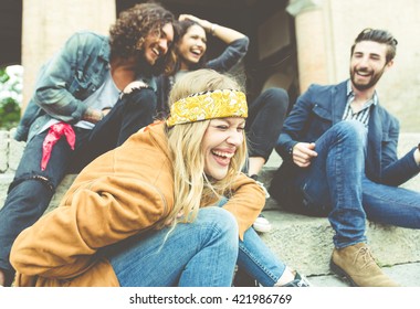 Group of four friends laughing out loud outdoor, sharing good and positive mood - Shutterstock ID 421986769