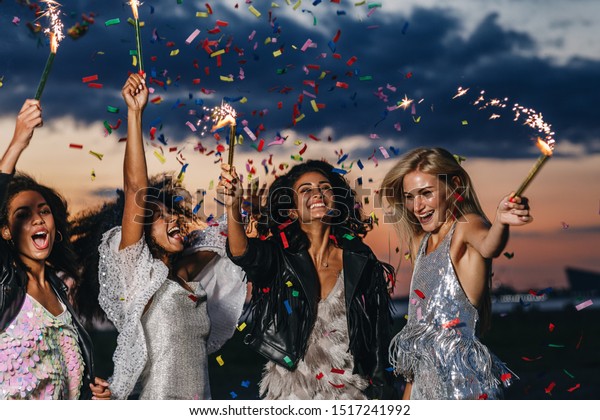 Group Four Happy Women Dancing Sparklers Stock Photo 1517241992 