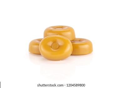 Group Of Four Whole Hard Caramel Cream Candy Butterscotch Variety Isolated On White Background