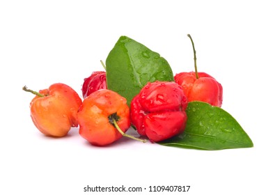 Group Of Fresh Organic Acerola Cherry With Green Leaves Isolated On White Background