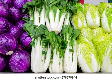 Group Of Fresh Organically Grown Red Cabbage, Baby Bok Choy And Napa Cabbage In The Farmer Market At Puyallup, Washington, USA. 