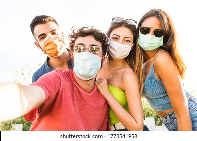 Group Friend Wearing Face Mask For Covid – Young People Using Mobile Phone Wearing Surgical Mask – Teenagers Hangout Using Smart Phone 