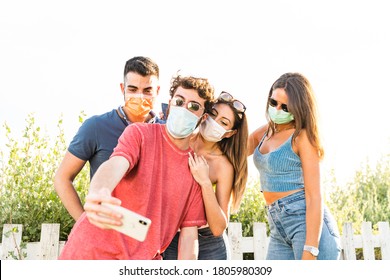 Group Friend Wearing Face Mask For Covid – Young People Using Mobile Phone Wearing Surgical Mask – Teenagers Hangout Using Smart Phone 