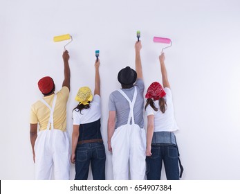 Group Of Friends About To Paint Wall.