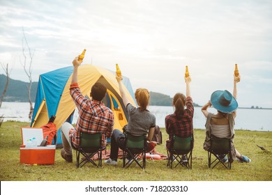 Group of Friends Asian having fun together and drinking beer Camp Forest Adventure Travel Remote Relax Concept,mountain view. - Powered by Shutterstock