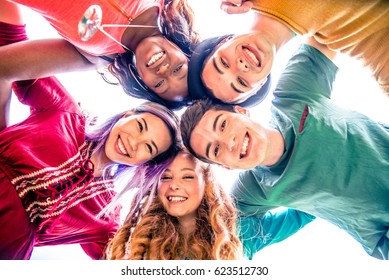 Group of friends bonding and having fun outdoors - Shutterstock ID 623512730
