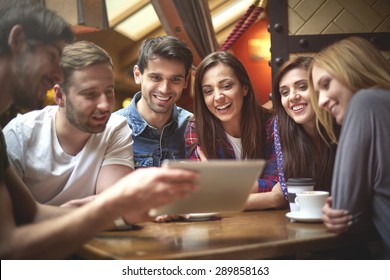 Group Of Friends In The Coffee Shop 