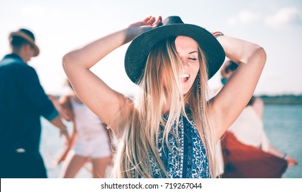 Group Of Friends Dancing And Celebrating On Beach, Boho Party Outdoor