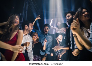 Group Of Friends Dancing In The Nightclub