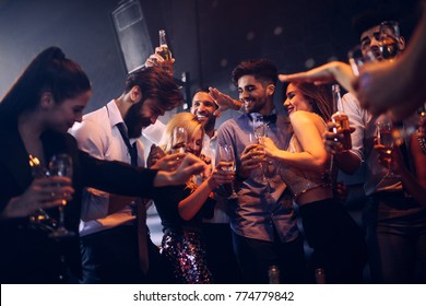 Group Of Friends Dancing At A Party