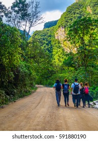 A Group Of Friends Descending From Machu Picchu To Aguas Calientes, Backwards Long Shot