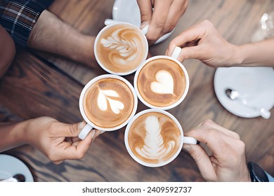 A group of friends drinking coffee together
 - Powered by Shutterstock