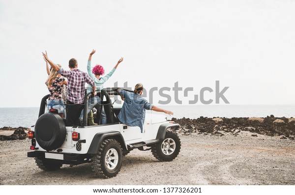 Group Friends Driving Off Road Convertible Stock Photo (Edit Now ...