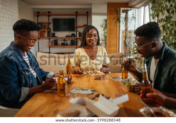 Group Friends Eating Takeaway Food While Stock Photo 1998288548 ...