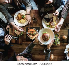 Group of friends eating together