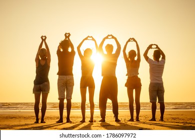 Group Of Friends Enjoying Sunset In Goa India